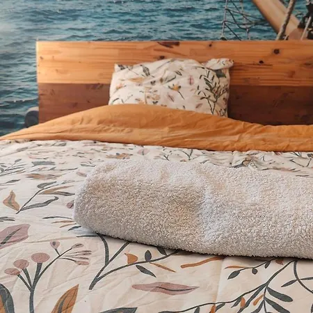A Cozy Bedroom In An *